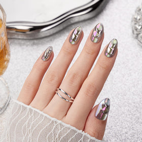 VSALON press-on nails with chrome cat-eye swirl for dramatic evening glamour.