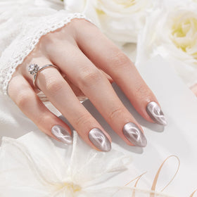 VSALON short almond cat-eye nails with silver shimmer for a salon-like at-home look.