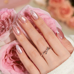 VSALON semi-transparent pink cat-eye nails create a soft luminous shimmer.