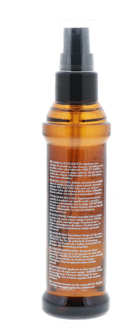 Vxoyo Ula-style Marrakesh Oil used on hair for smoothing application