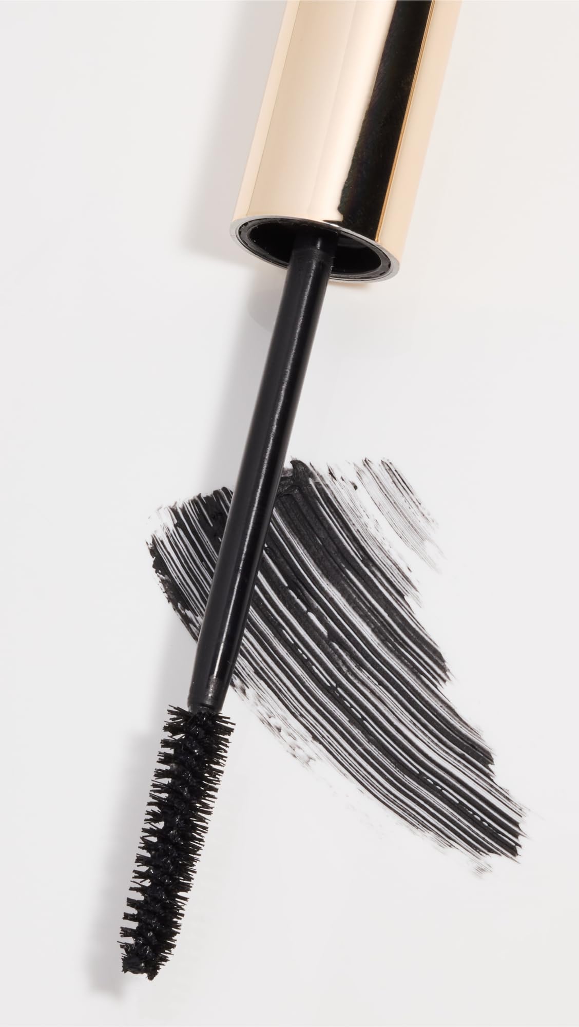 Tube application of Wander Beauty mascara highlighting waterproof wear and conditioning castor oil