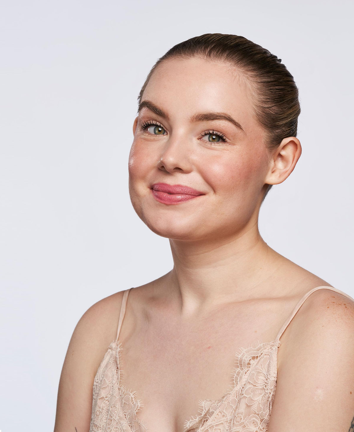 Wander Beauty On-the-Glow dual-ended stick on lips and cheeks for multitask use.