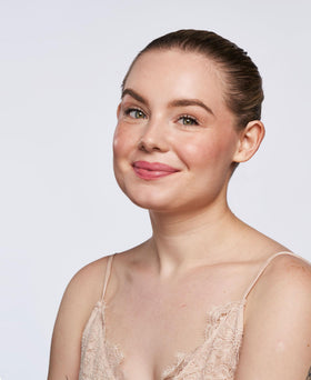 Wander Beauty On-the-Glow dual-ended stick on lips and cheeks for multitask use.