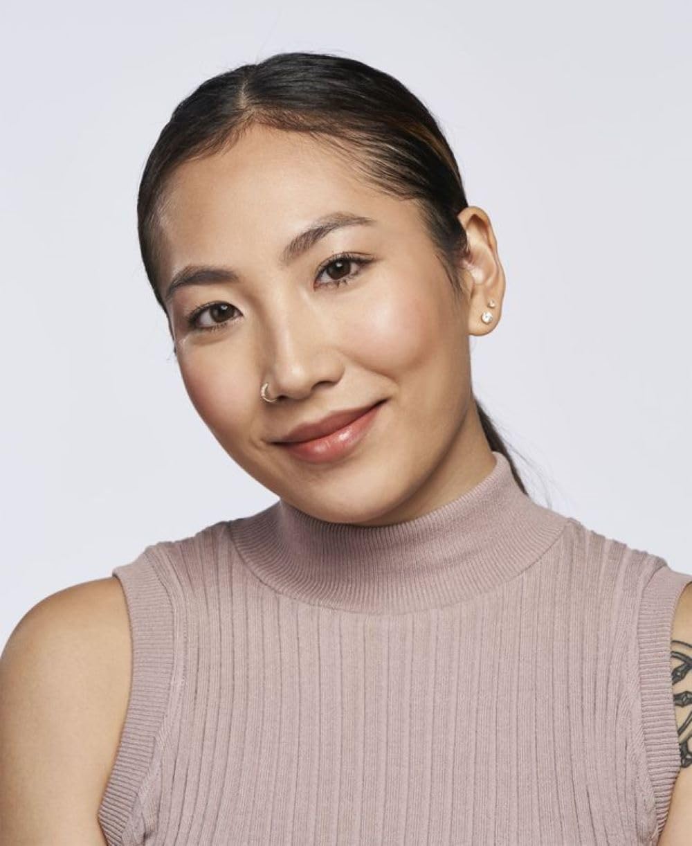 Wander Beauty On-the-Glow stick blush on cheeks and lips showcase creamy color.
