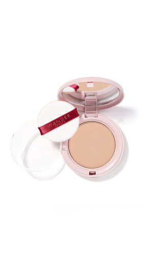 Wander Beauty Wanderlust Powder Foundation compact for on-the-go touch-ups with a lightweight finish.