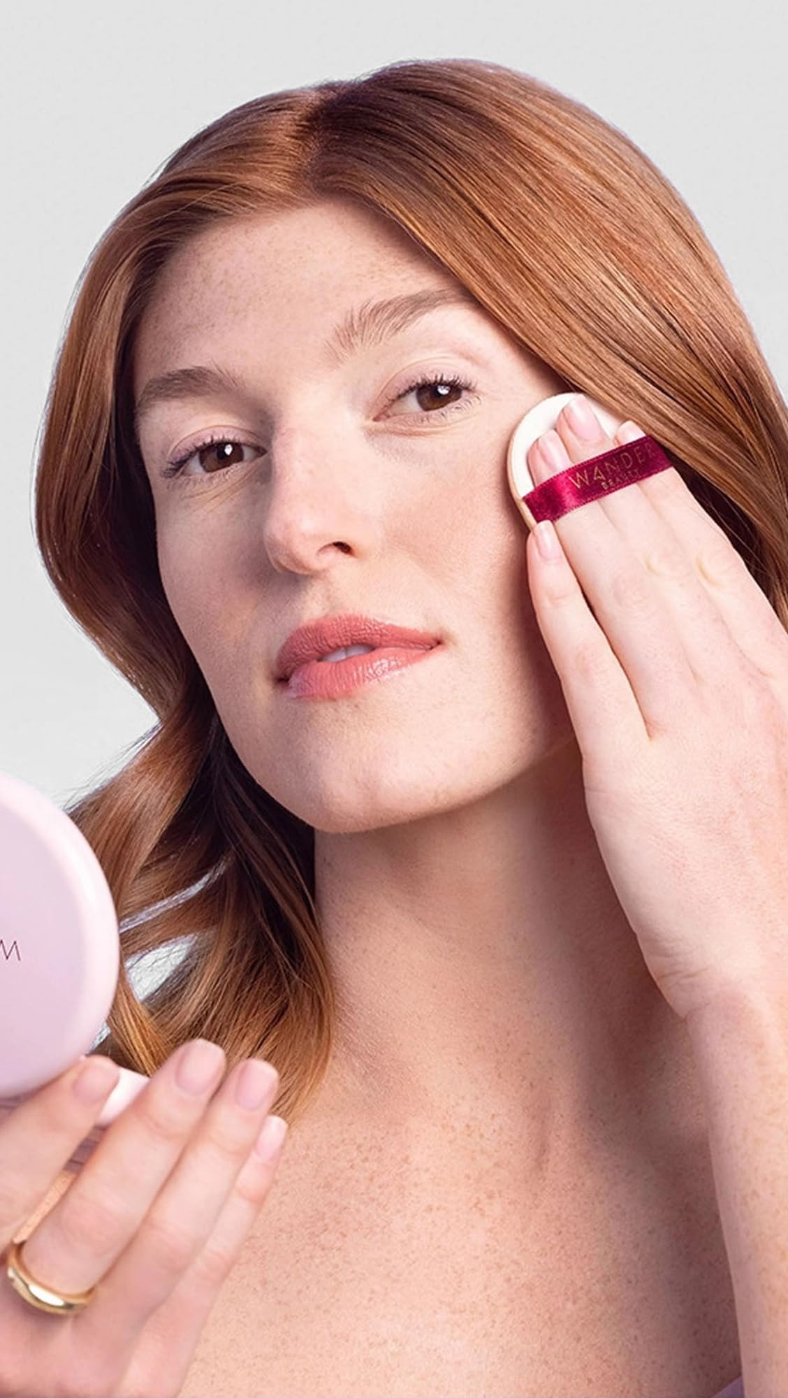 Wander Beauty Wanderlust Powder Foundation fair finish closeup highlights natural texture.