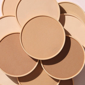 Wander Beauty Wanderlust Powder Foundation dusting finish controls shine and refines texture.