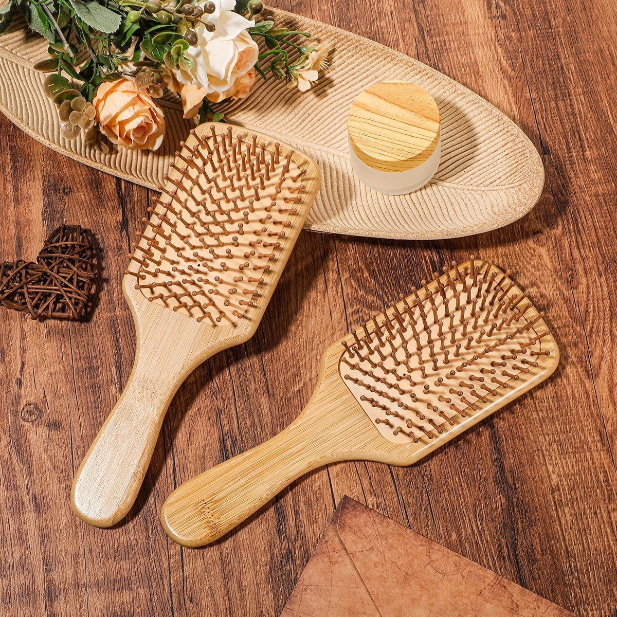 Wanmu bamboo brush ball-tipped bristles gently massage the scalp for comfortable styling.