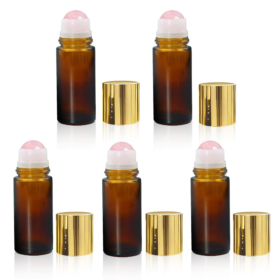 Warmify rose quartz roller bottle 50ml with crystal roller ball for even essential oil distribution.