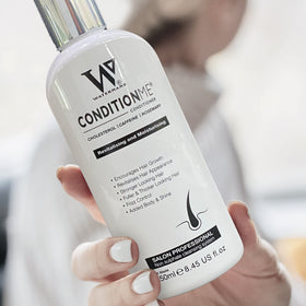 Watermans conditioner repairing damaged hair, restoring strength and resilience.