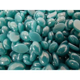 Scented Waxness green tea beads in kit layout for salon use