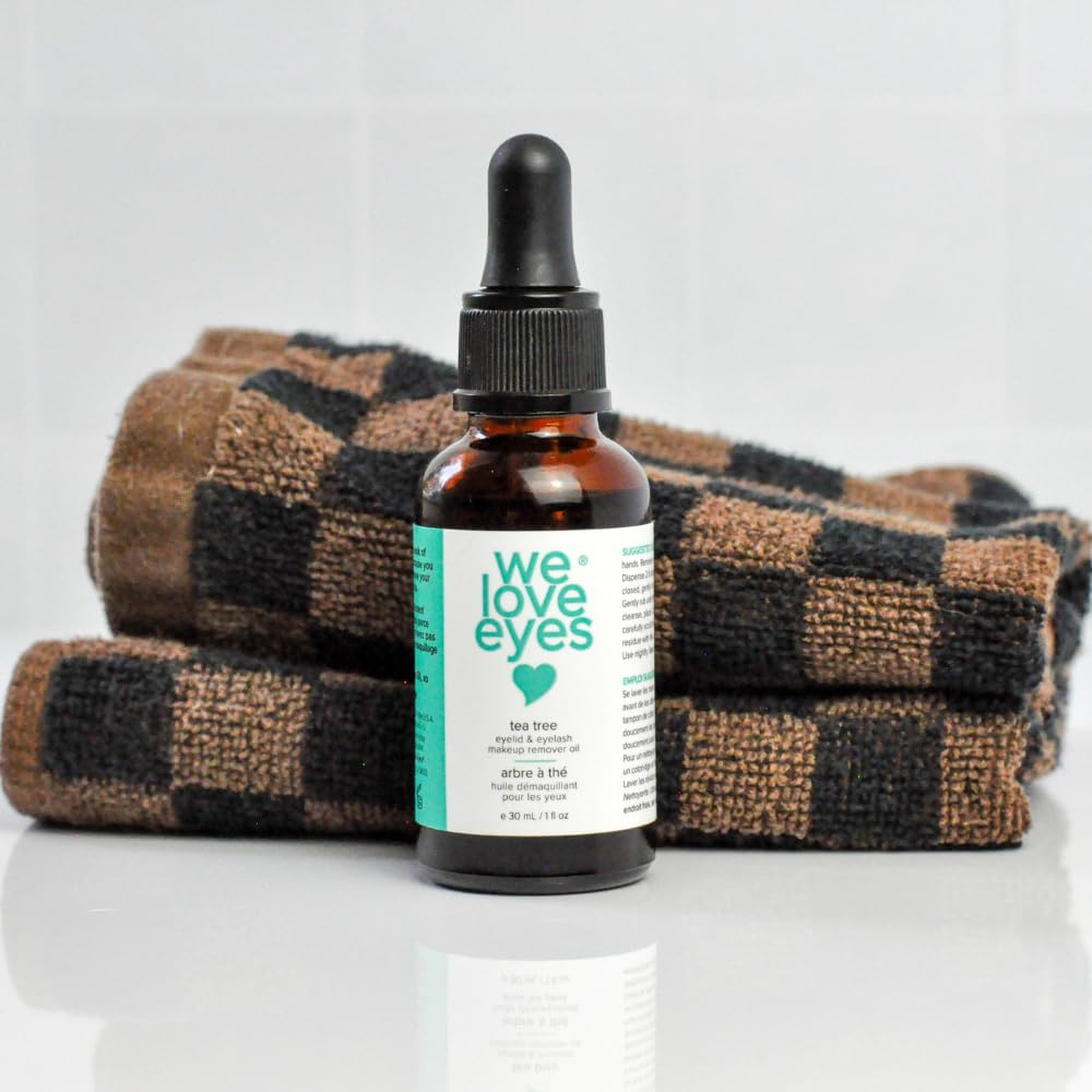 We Love Eyes remover oil close-up shows bottle and texture for quick daily cleansing.