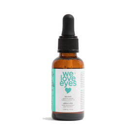 We Love Eyes tea tree makeup remover oil bottle for gentle waterproof makeup removal.