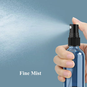 Wedama amber glass spray bottle close-up showing UV protection and durability.