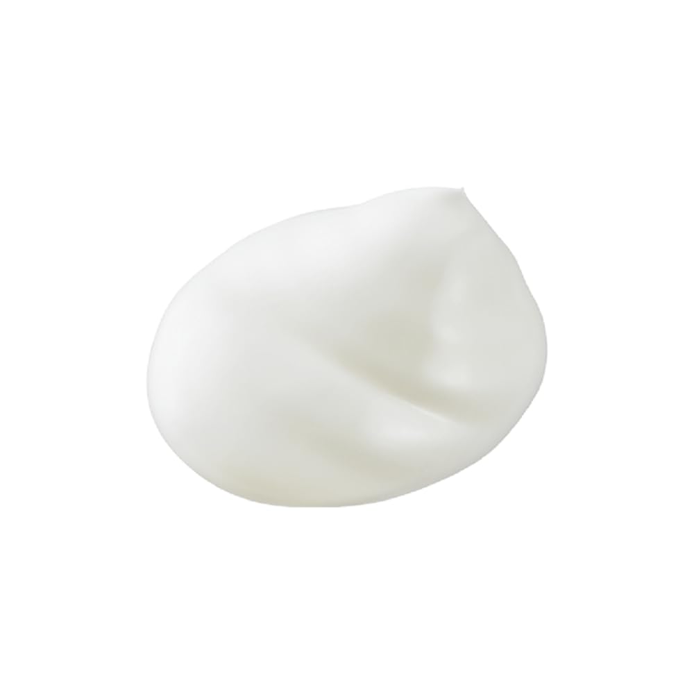 Weleda Almond Soothing Cleansing Lotion creamy texture close-up; respects natural lipids.