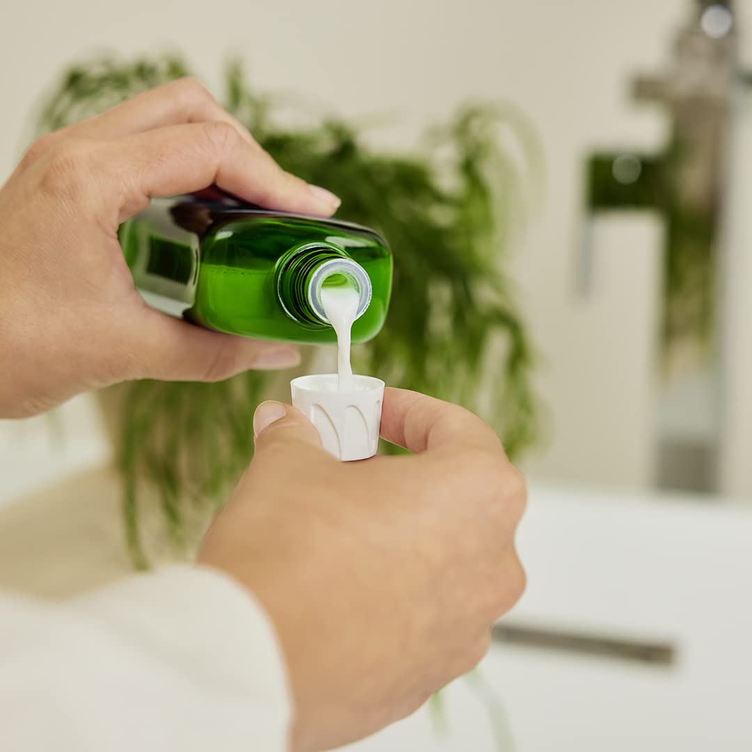 Weleda Arnica Muscle Soak label visible for a calming bath ritual.
