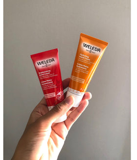 Weleda Regenerating Pomegranate Hand Cream close-up of creamy texture on skin