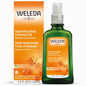 Close-up of Weleda Sea Buckthorn oil texture showing a rich, nourishing feel.