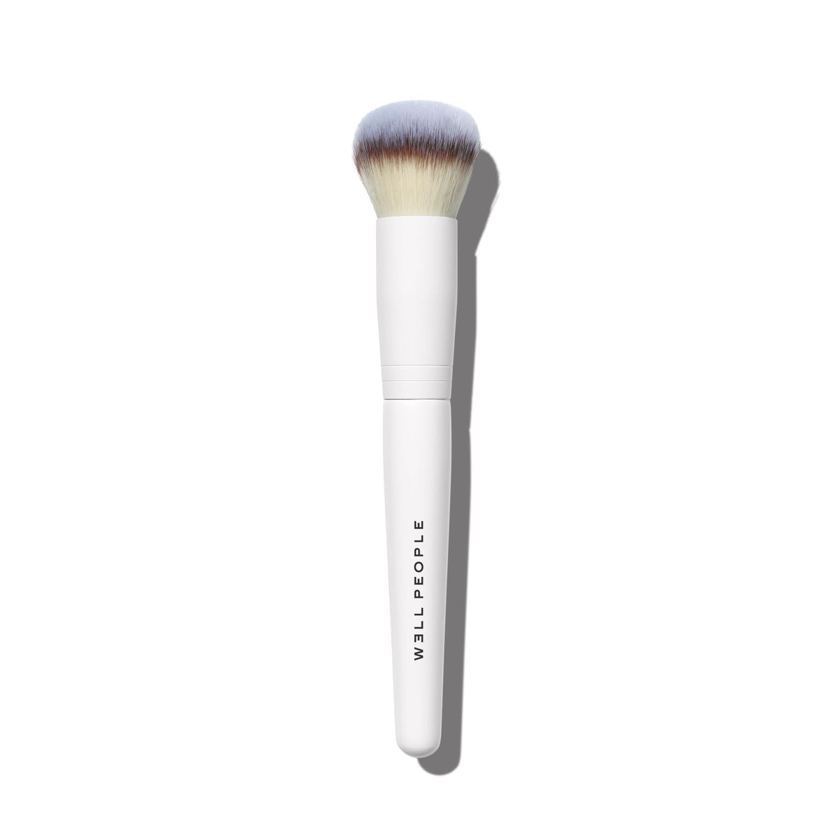 Well People Buffing Brush with dome-shaped bristles for seamless blending.