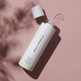 Well People Dewy Juice hydration bottle conveys daily skincare preparation