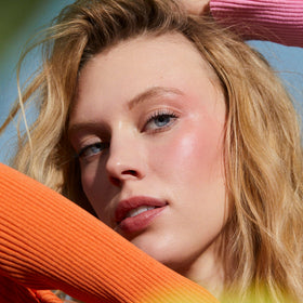Well People Lip Butter Peach packaging highlights vegan, clean beauty