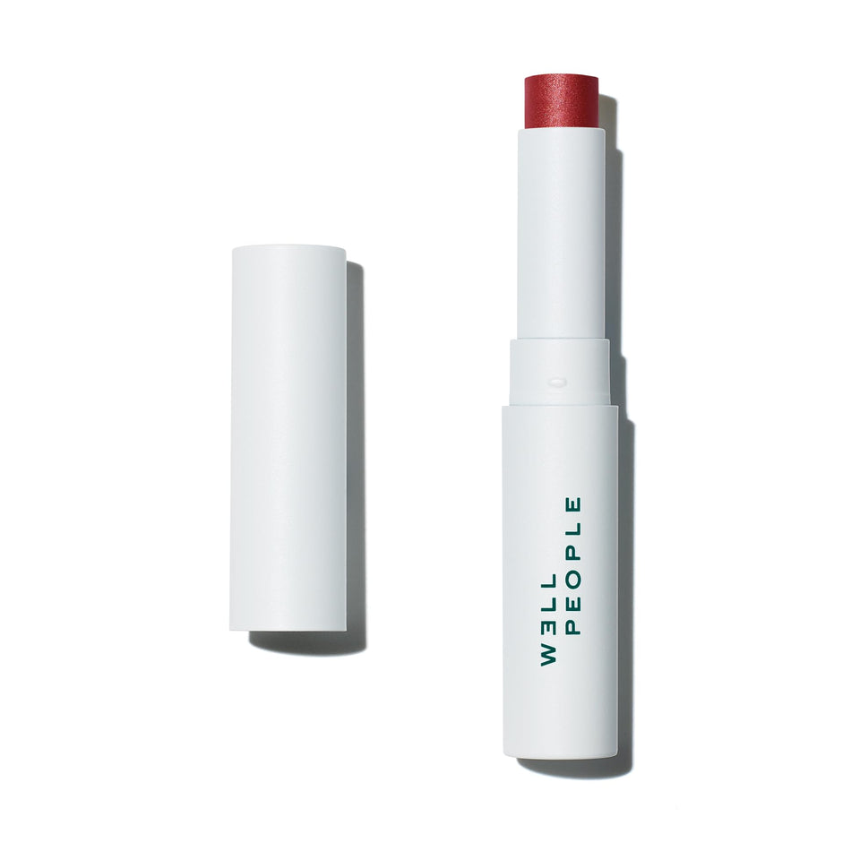 Well People Lip Butter SPF 15 tint close-up showing creamy hydration and color.