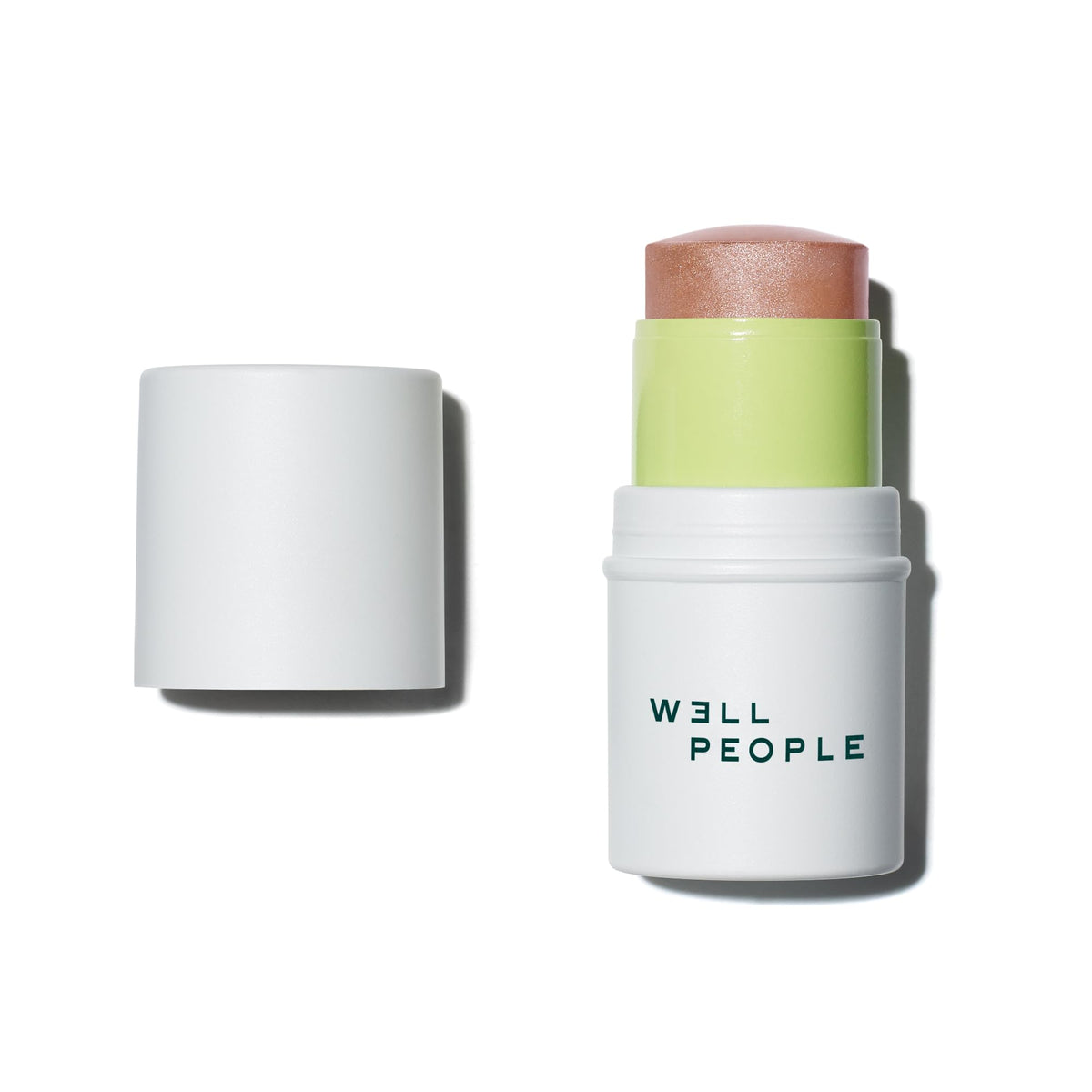 Well People Supernatural Stick Highlighter creates a radiant, hydrating glow with a creamy texture.