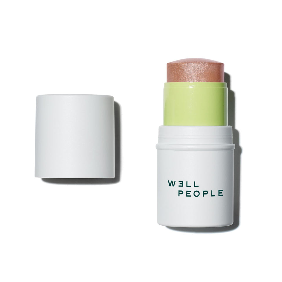 Well People Supernatural Stick Highlighter creates a radiant, hydrating glow with a creamy texture.