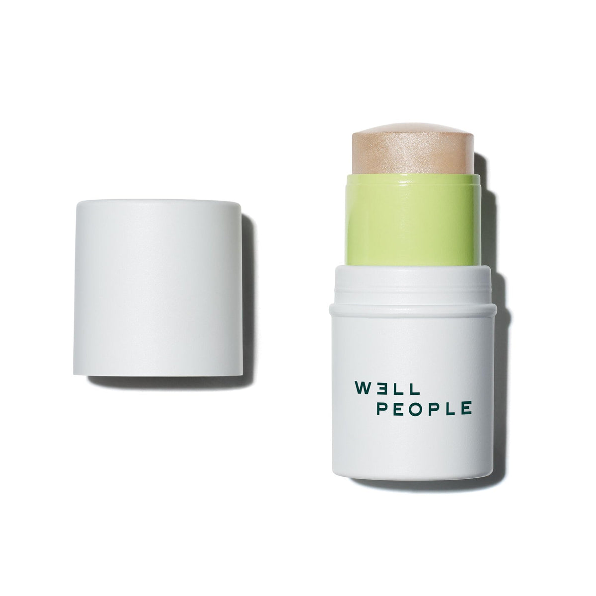 Well People Supernatural Stick Highlighter front view shows creamy glow and smooth glide
