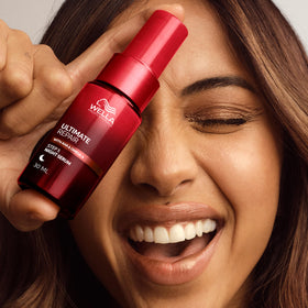 Wella Professionals ULTIMATE REPAIR Night Serum wrap-around label hints at vegan and dermatological testing.