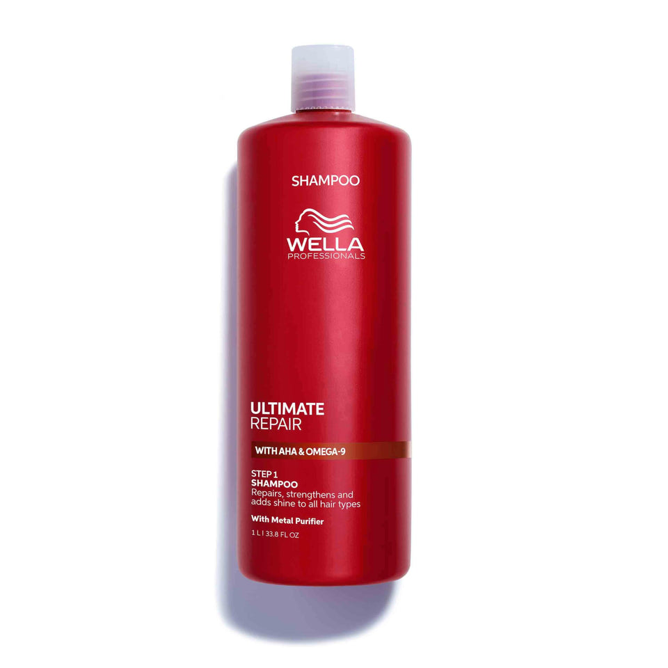 Wella Professionals Ultimate Repair Shampoo bottle showing gentle cleansing and luxurious foam for damaged hair.