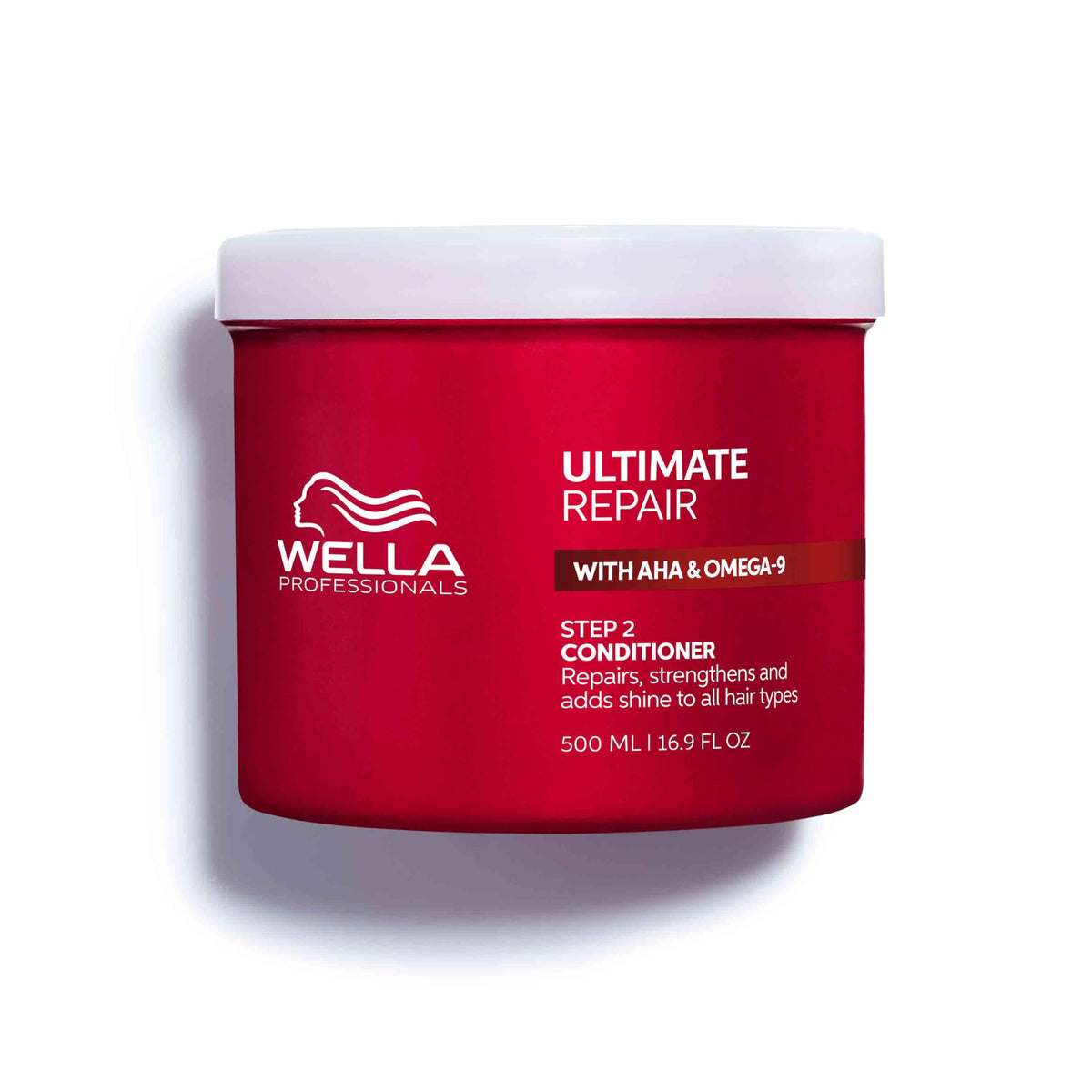 Wella ULTIMATE REPAIR bottle close-up showing rich conditioner for damaged hair