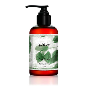 WEN Tea Tree Styling Creme bottle demonstrates frizz control and shine.