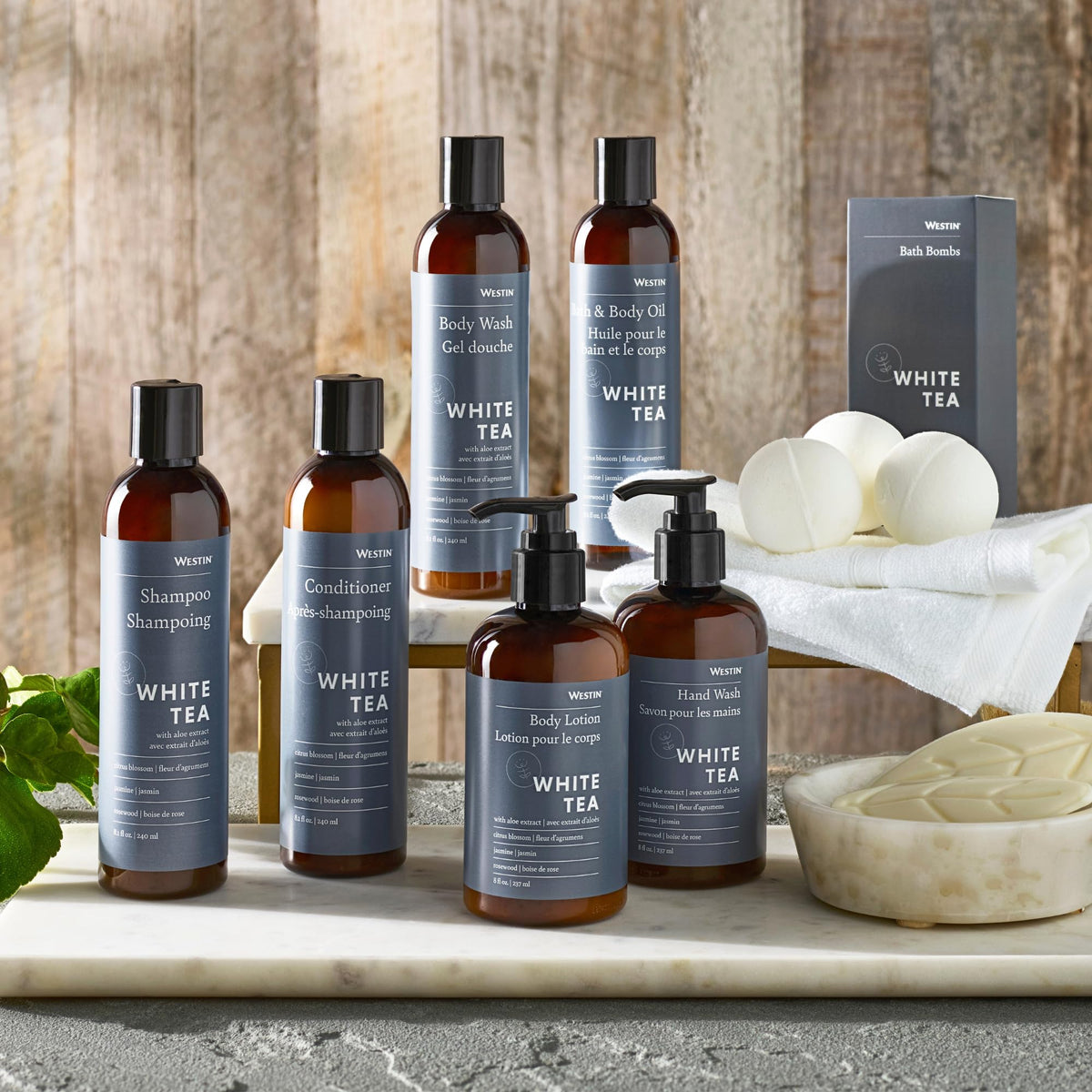 Hair being washed with Westin conditioner for a lightweight, nourished feel