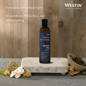 Close-up of Westin White Tea Aloe Conditioner label highlighting paraben-free and color-safe formula