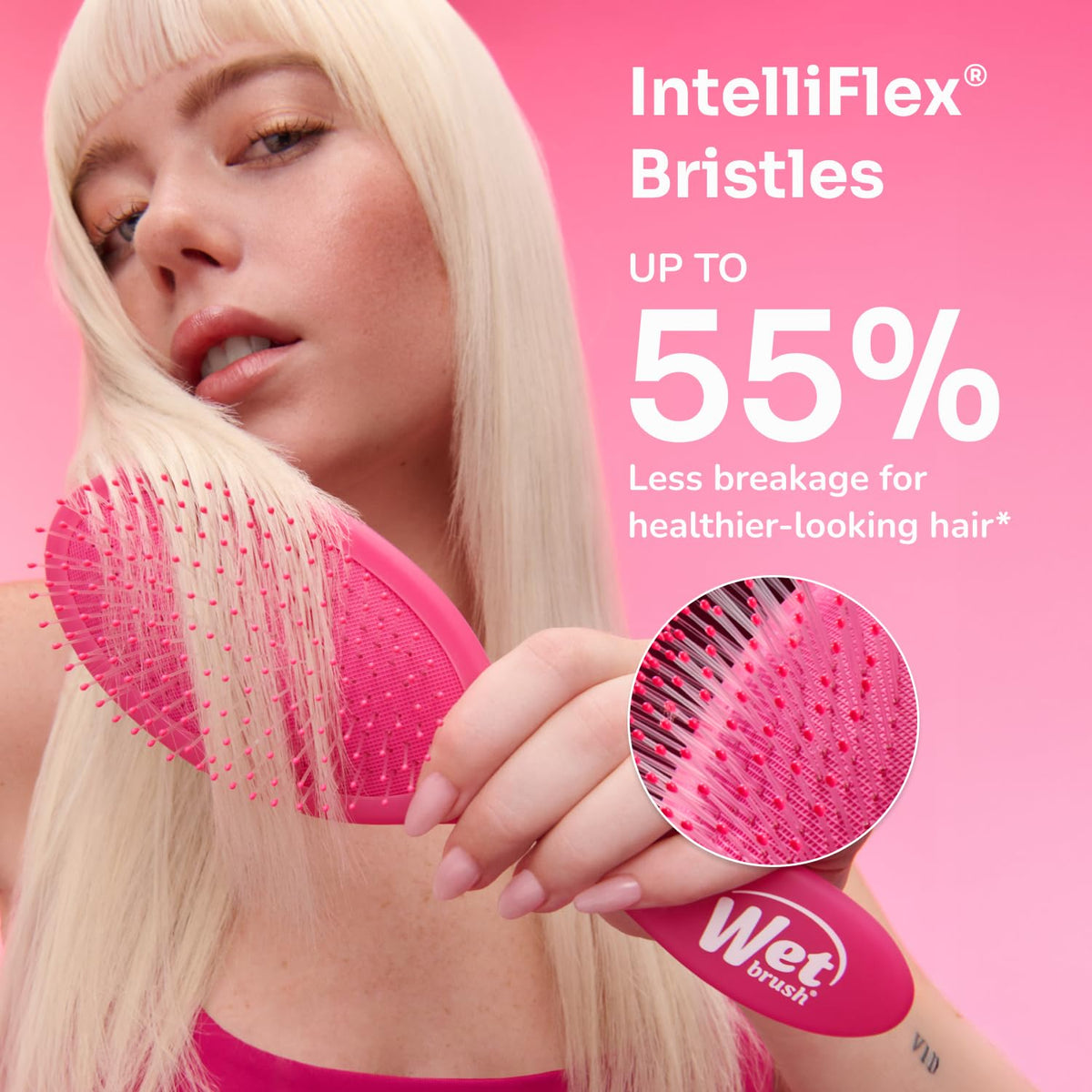 Wet Brush Original Detangler pink gliding through dry hair