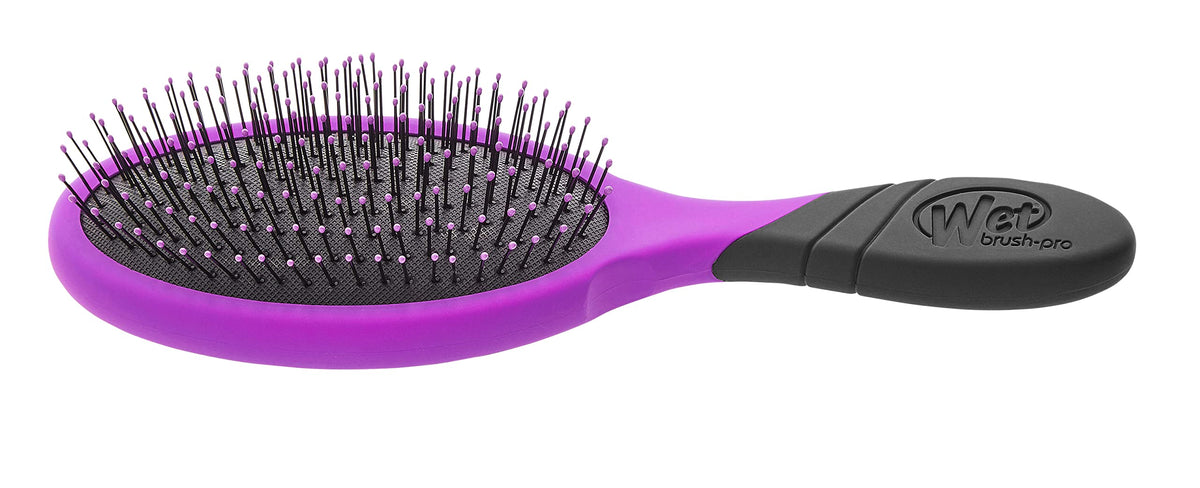 Wet Brush Pro Detangler Purple packaging highlights ergonomic design and comfort.