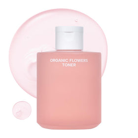 Whamisa Organic Flowers Toner bottle close-up with rose infusion for hydration.