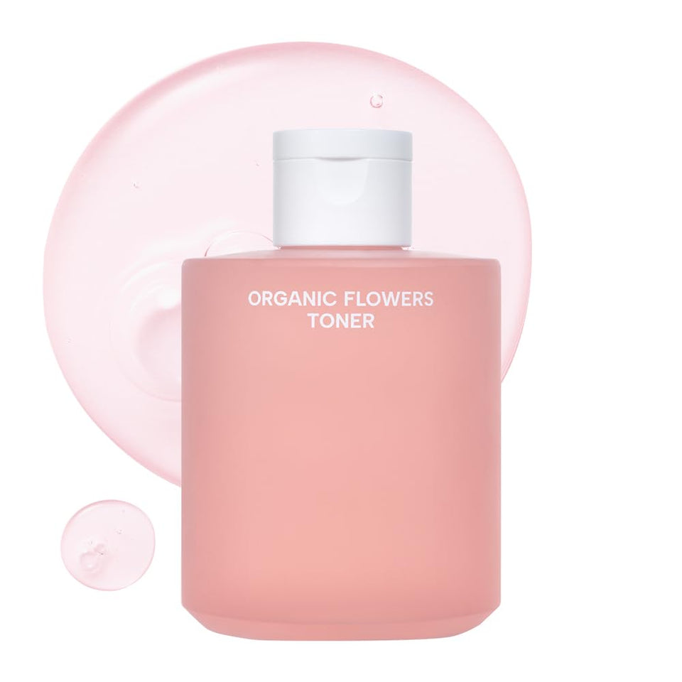 Whamisa Organic Flowers Toner bottle close-up with rose infusion for hydration.