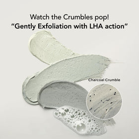 Charcoal powder exfoliation close-up demonstrating deep pore cleansing.