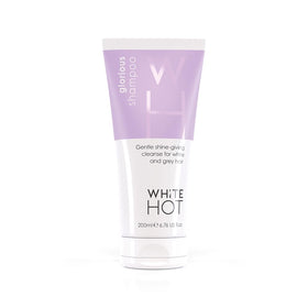 White Hot Glorious Shampoo bottle on shelf offers vegan, cruelty-free care.