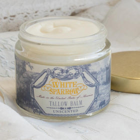 White Sparrow Farmacy tallow balm jar showing fragrance-free face and body moisturizer.