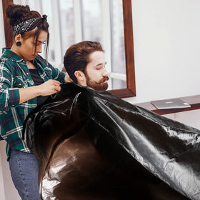 Willbond disposable dye cape simplifies cleanup after appointments