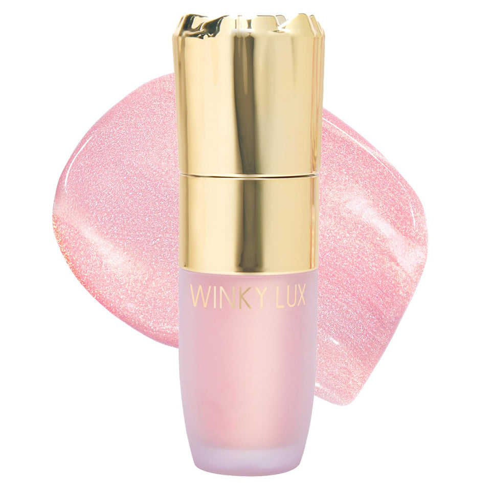 Winky Lux Cheeky Rose highlighter bottle glows with dewy pink opal shine.