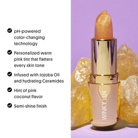 Winky Lux Citrine Glimmer Balm tube emphasizing ceramides for lasting moisture.