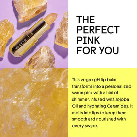 Winky Lux Citrine Glimmer Balm on lips delivering sheer glide and tint.