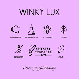 Winky Lux In The Stars lip oil swirl demonstrates a light, glide-on texture.