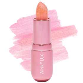 Winky Lux Pink Opal Glimmer Balm bloom tint creates a golden pink glow.