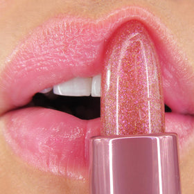 Winky Lux Pink Opal Glimmer Balm Raspberry Vanilla fragrance adds sweetness.