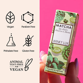 Night-time use of Winky Lux Matcha lip balm with calming vanilla–green tea scent.